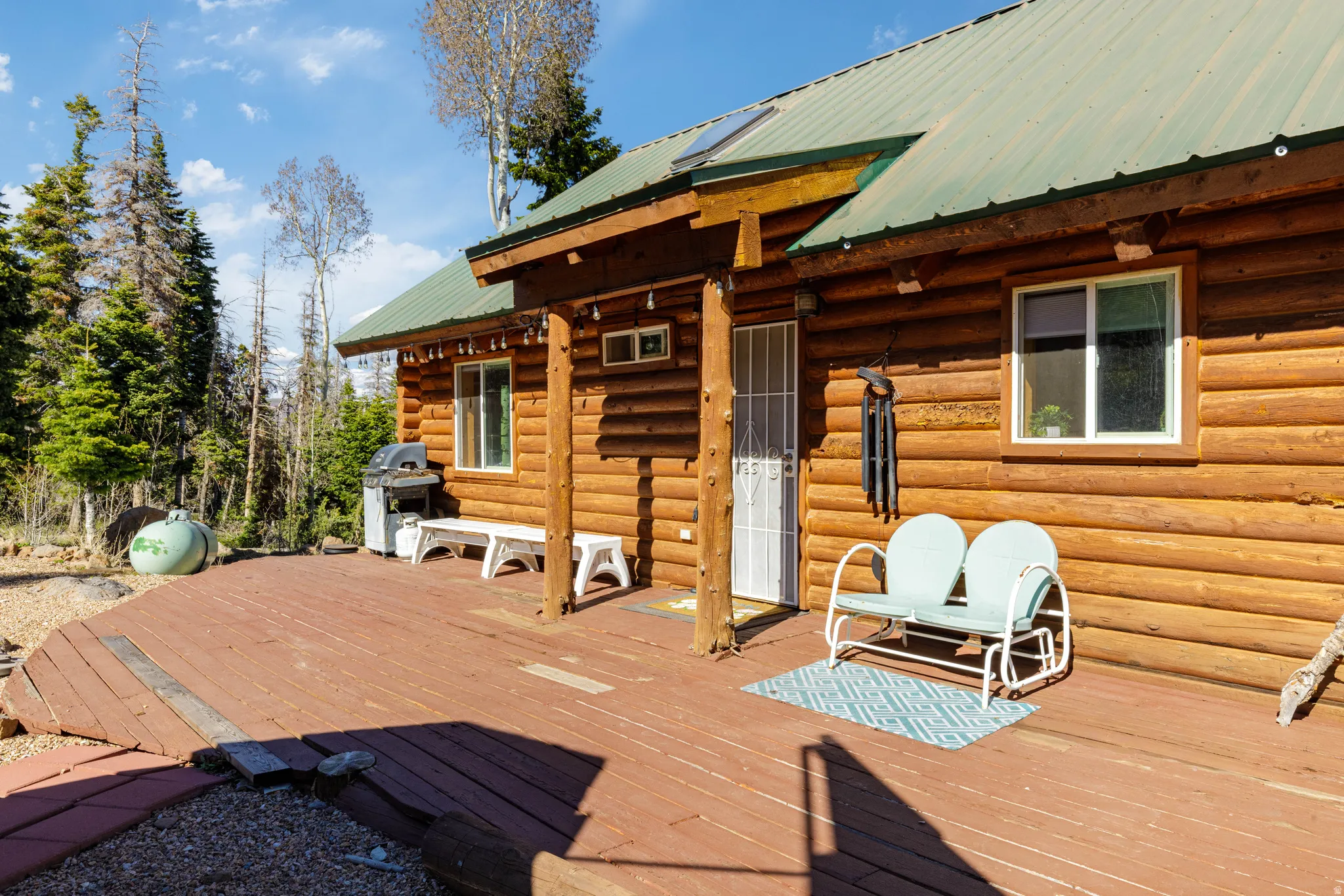 Outdoor Relaxation Area: Secluded deck space designed for relaxation and mountain air.