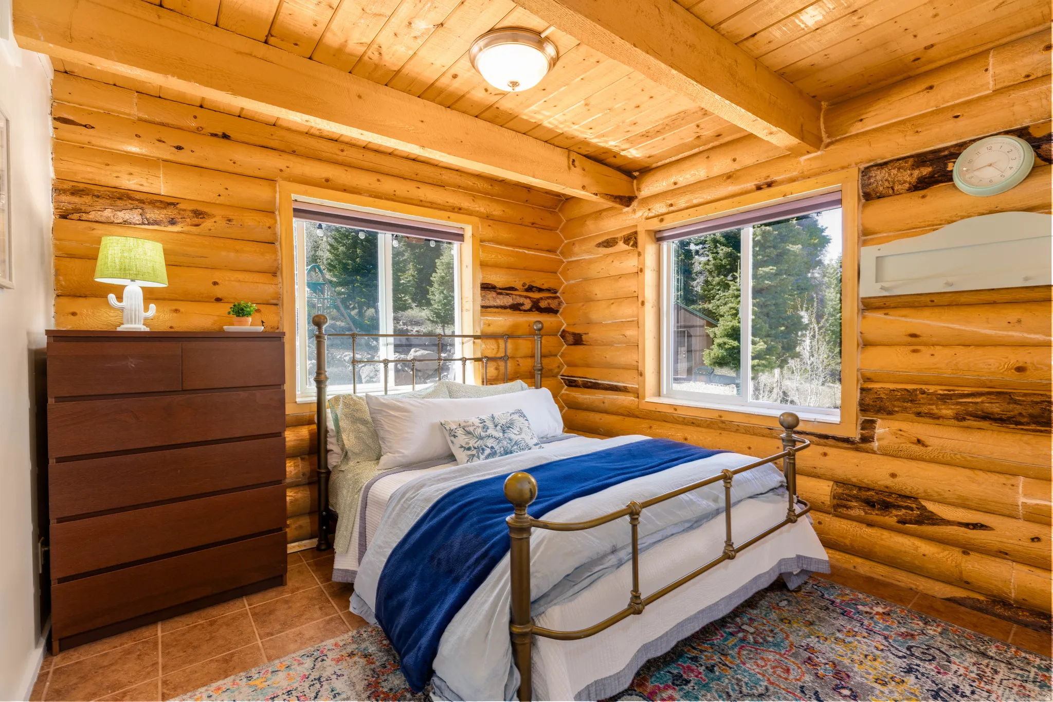 Guest Bedroom: Cozy and bright guest room with rustic mountain charm.