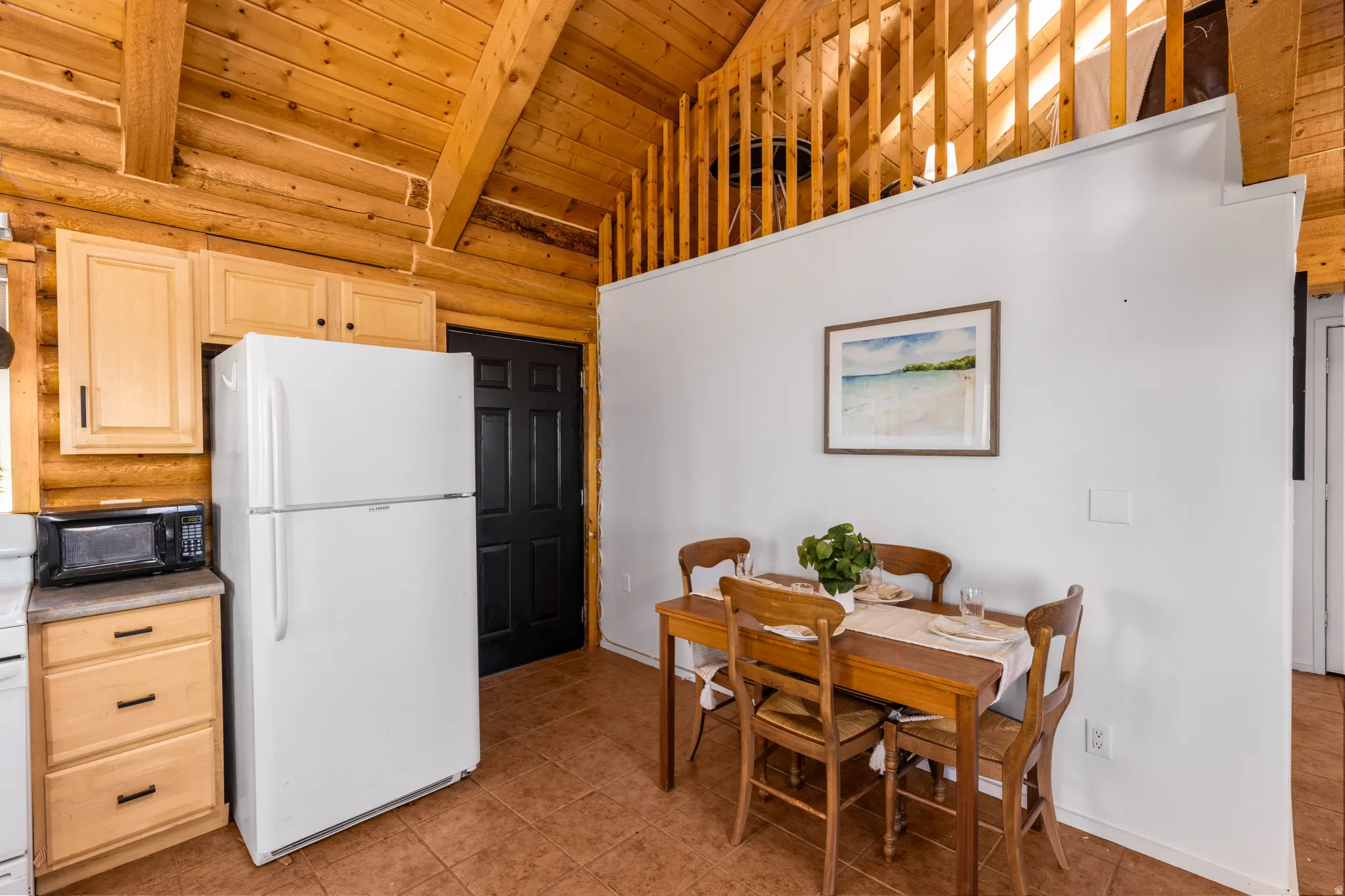 Dining Area: Dedicated space for mountain meals located just off the kitchen.