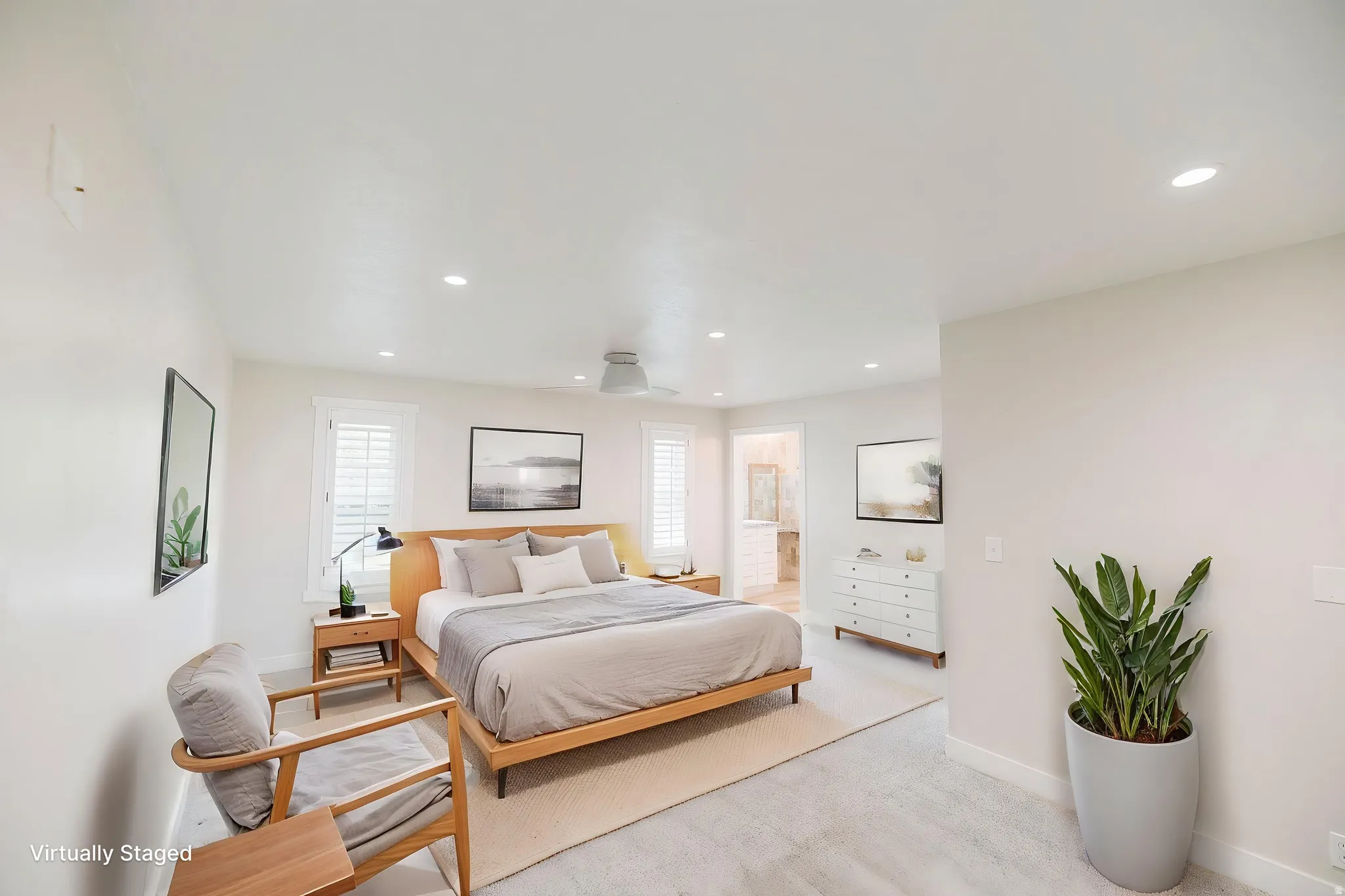Bedroom with recessed lighting and connected bathroom