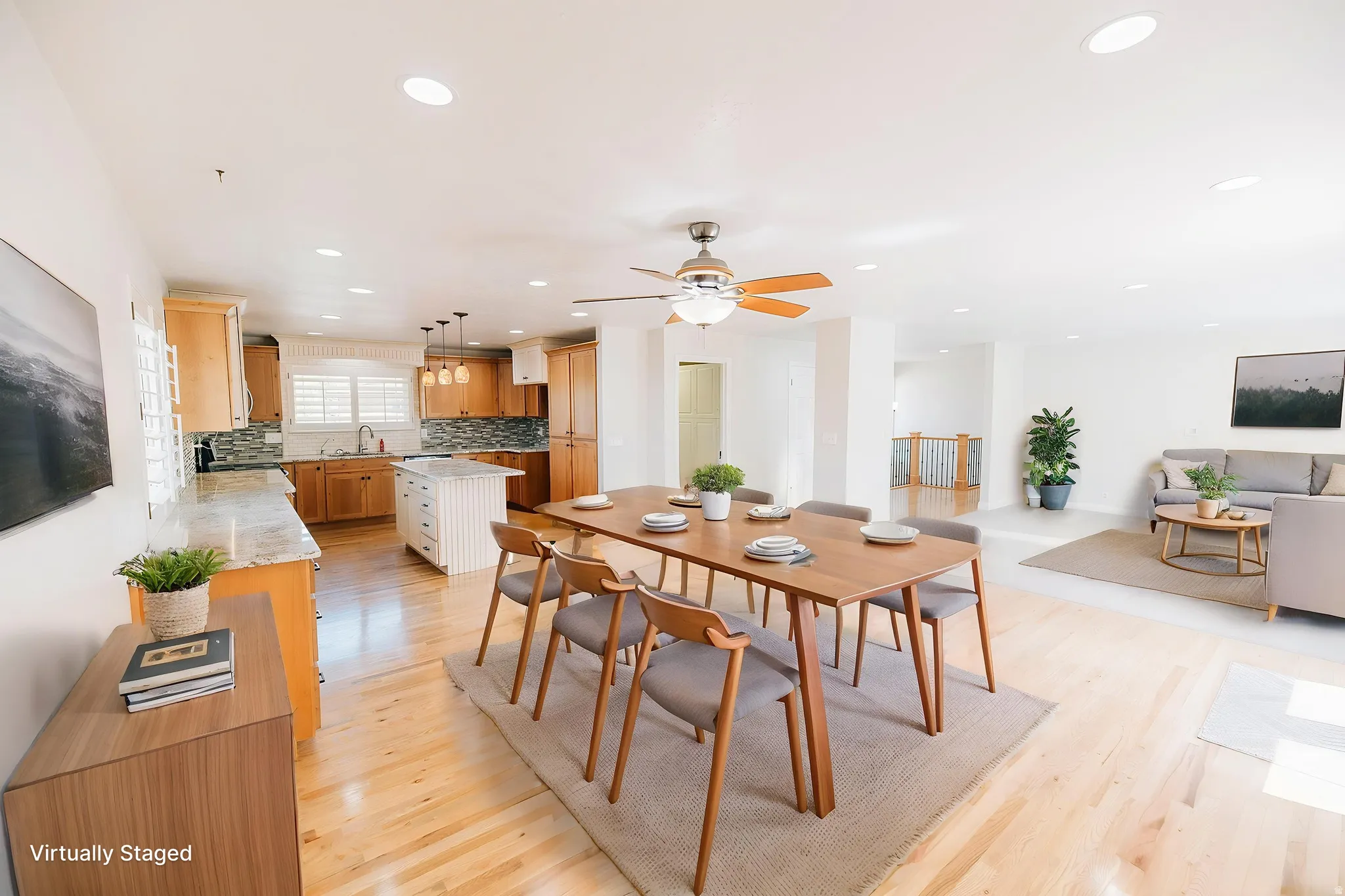 Dining space featuring light wood-type flooring, recessed lighting, and a ceiling fan