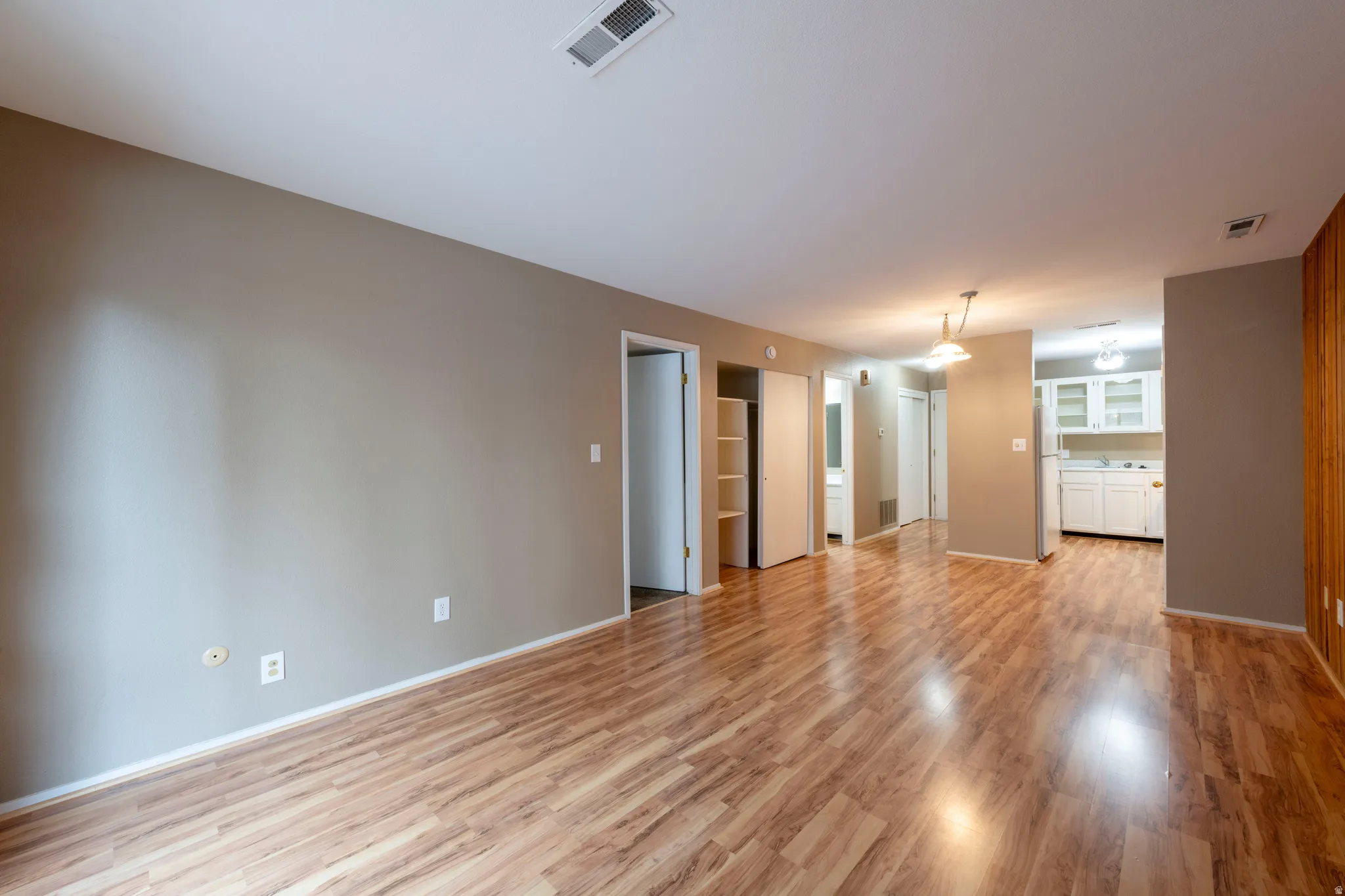 Living room featuring light wood finished floors and baseboards
