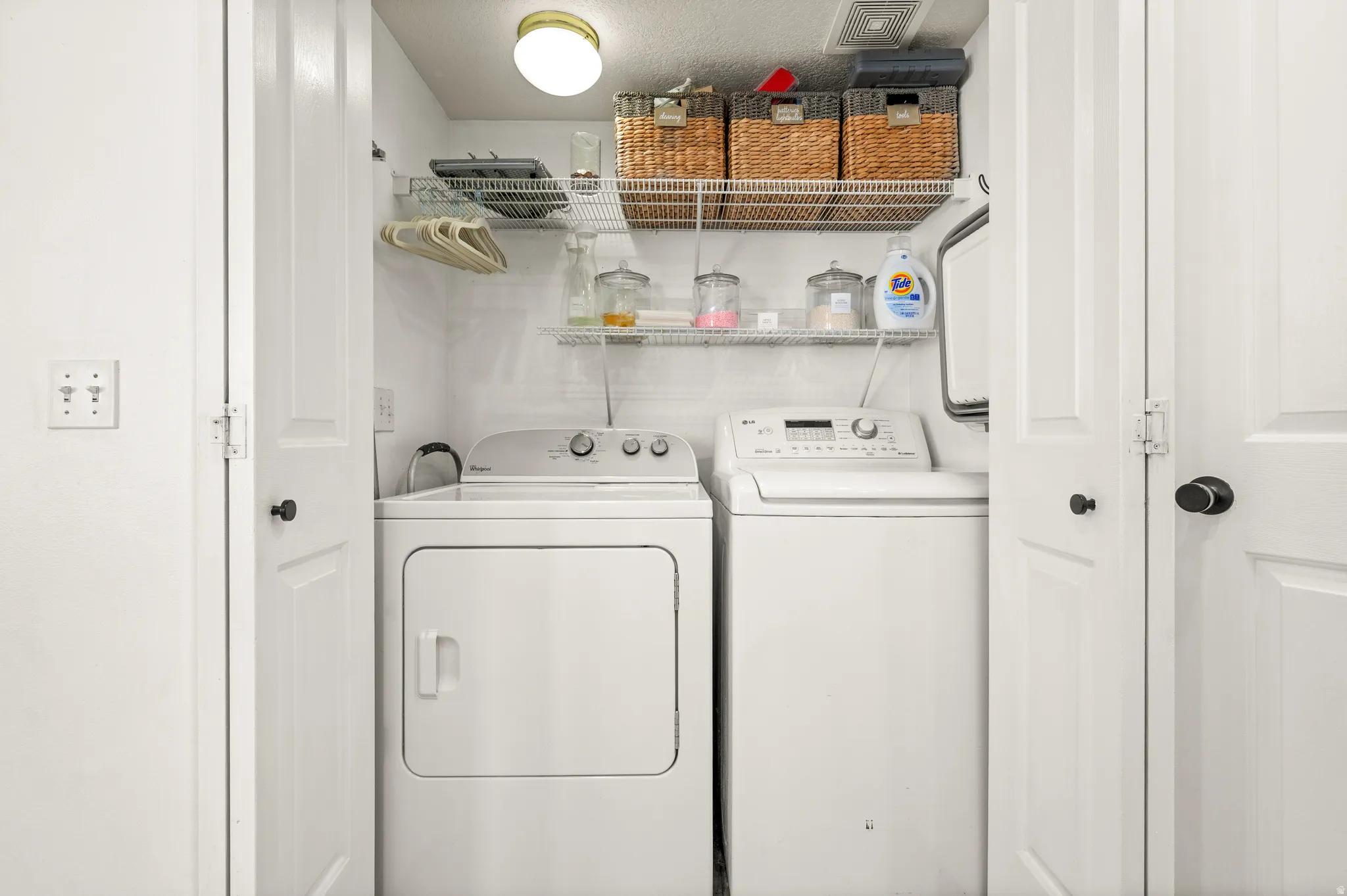 Laundry area with separate washer and dryer