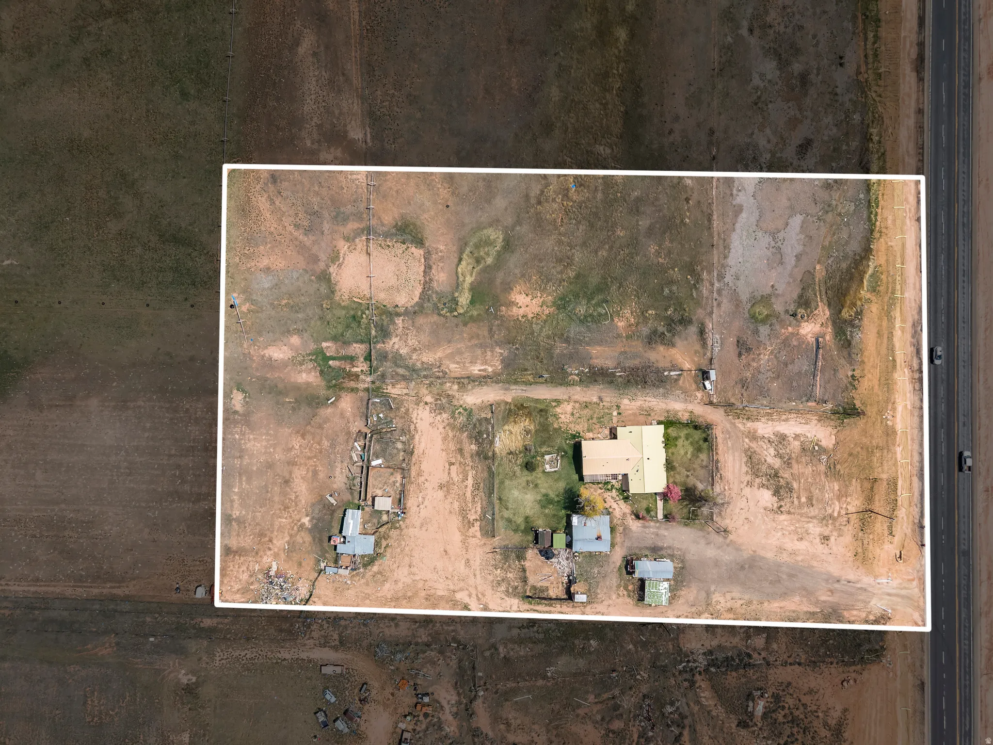 Aerial overview of property's location featuring property boundaries highlighted