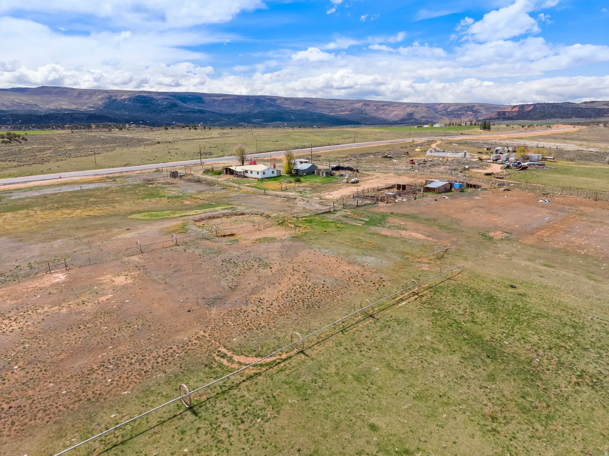 Overview of rural landscape with a mountainous background