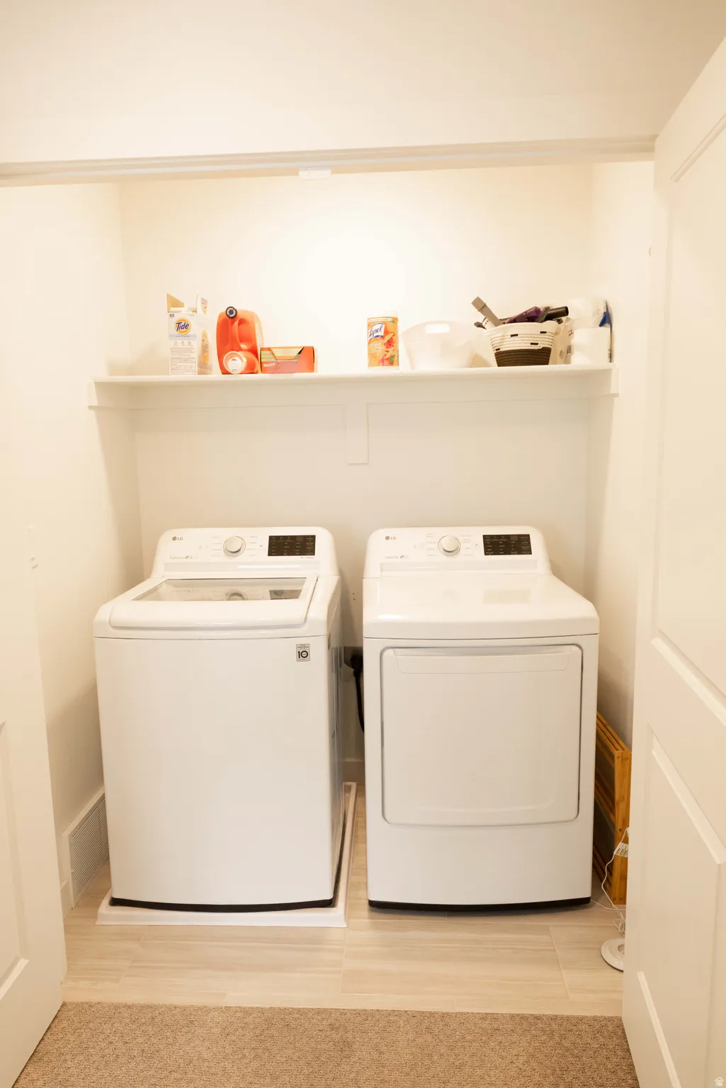 Laundry area with separate washer and dryer