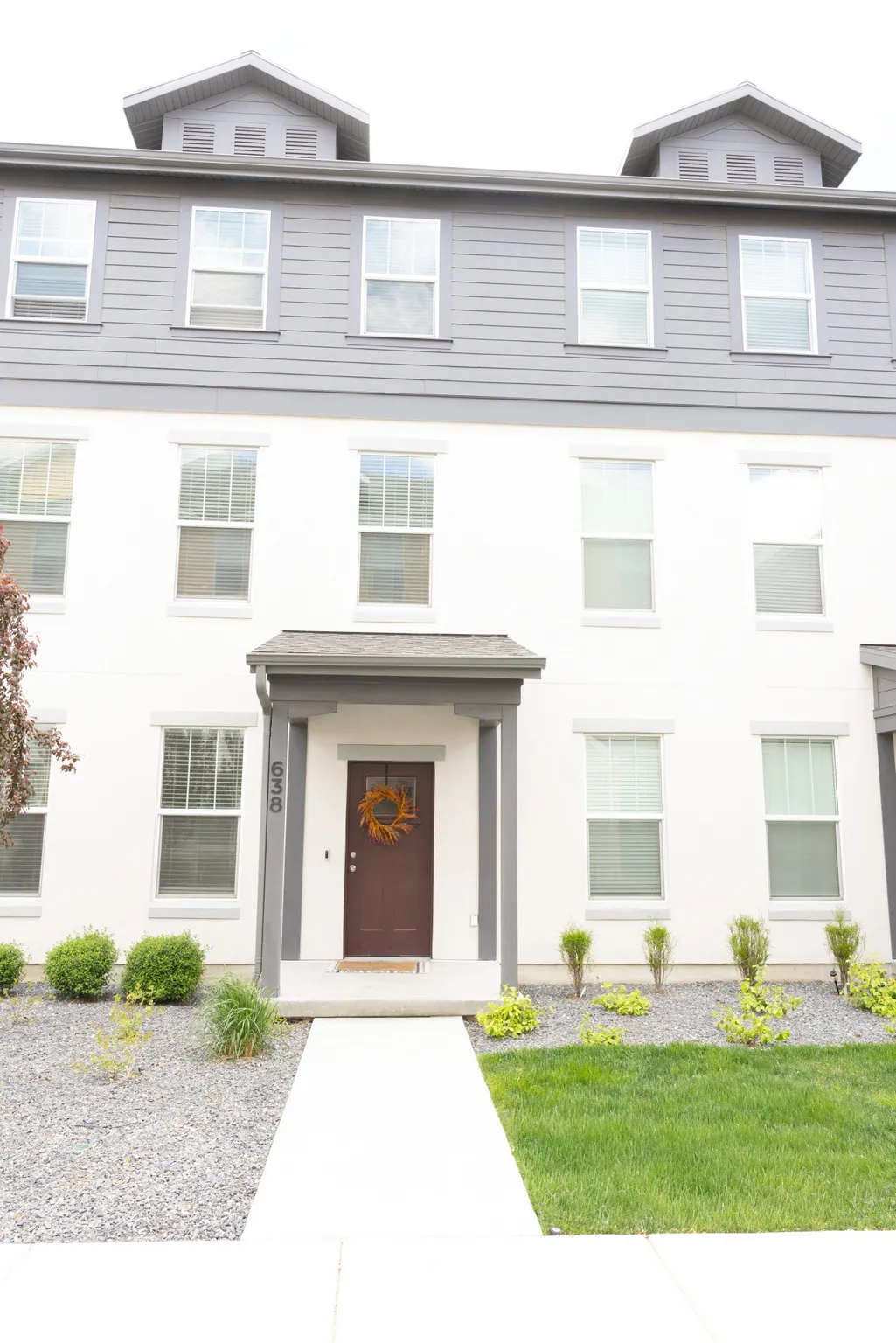 View of front of house featuring stucco siding