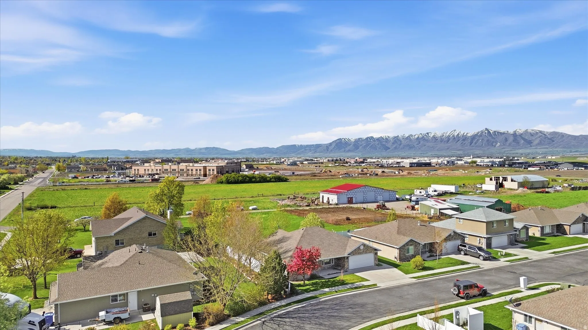 Aerial perspective of suburban area featuring mountains
