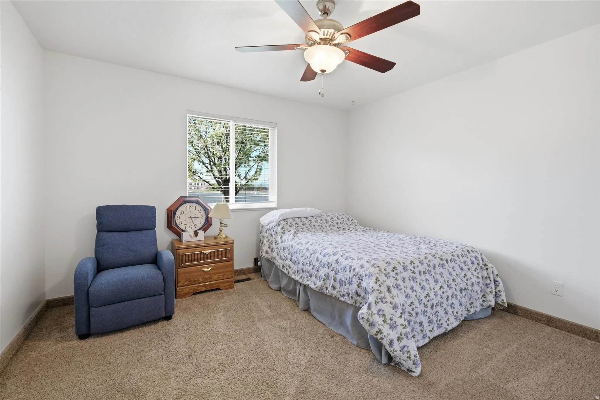 Bedroom #2 featuring natural light, closet and light carpet