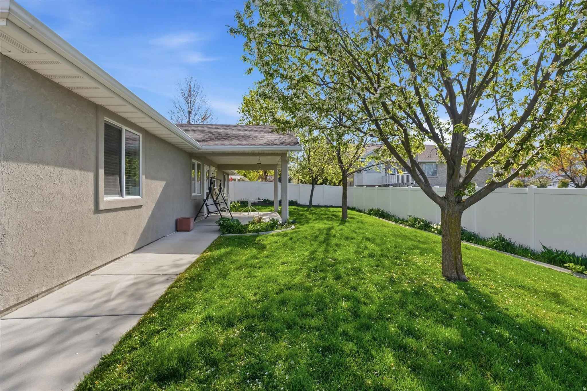View of fenced backyard
