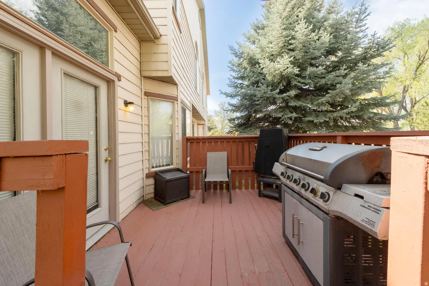 Wooden deck with area for grilling