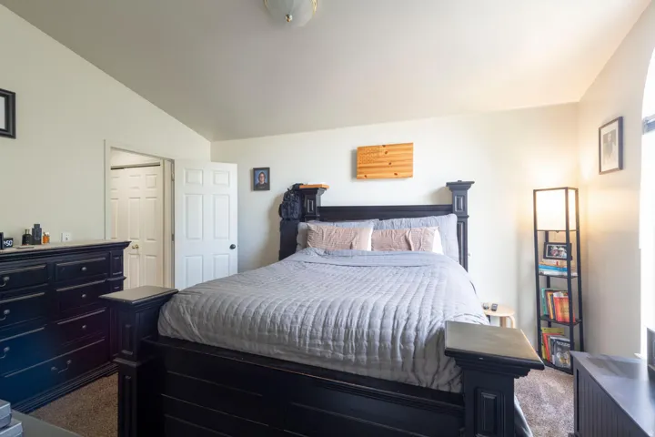 Primary ensuite bedroom with large walk-in closet