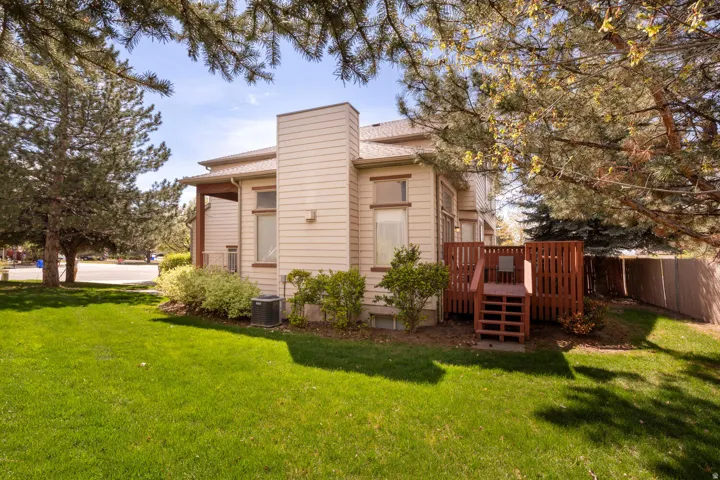 Rear view east unit and it's wood deck