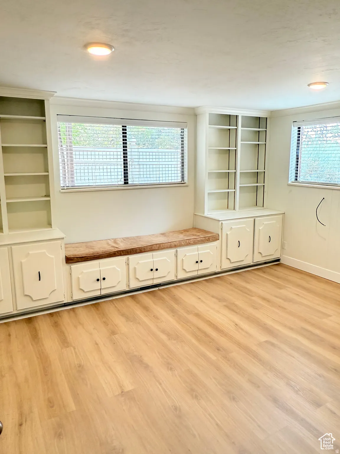 Mudroom with light wood-type flooring
