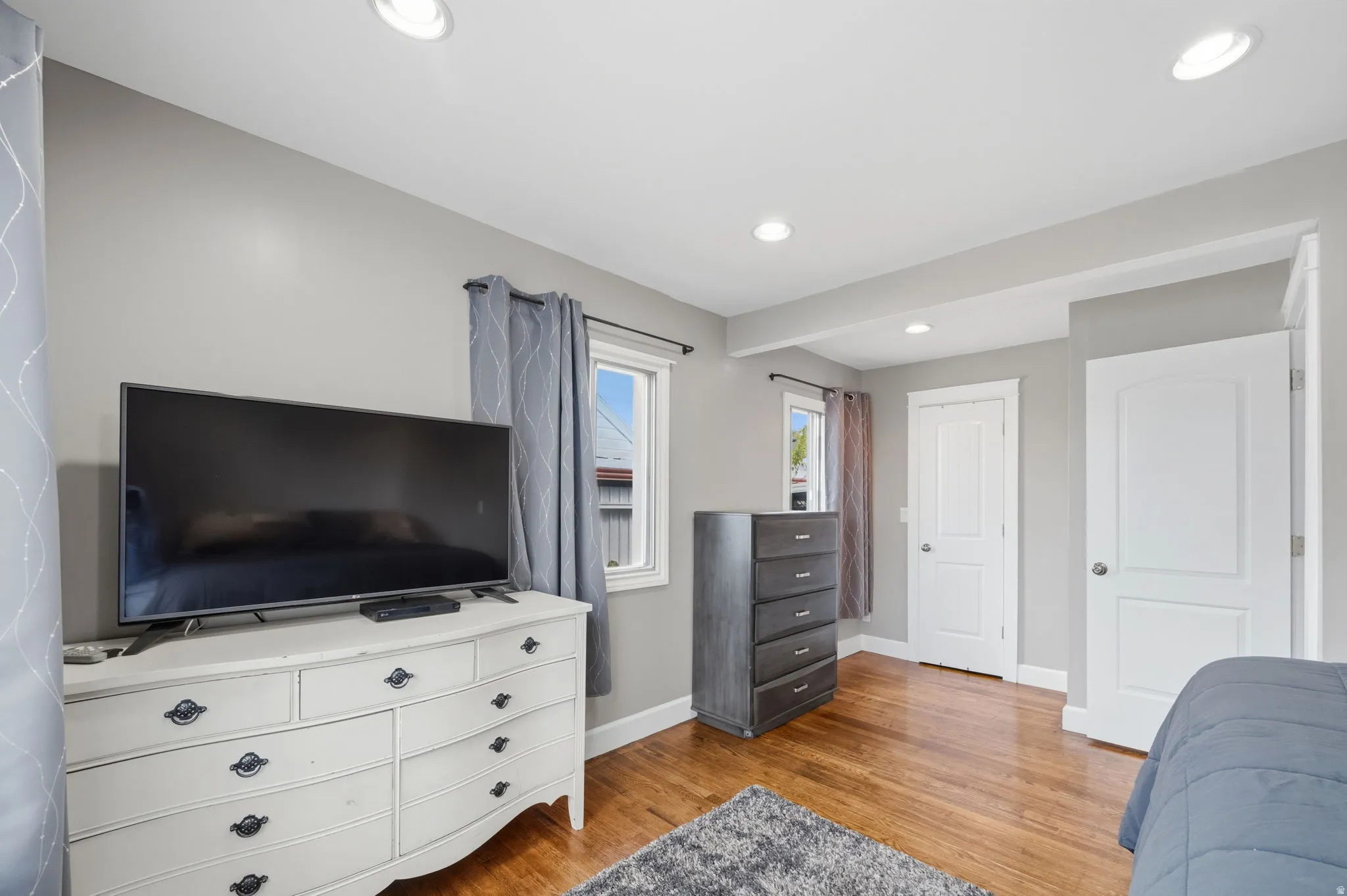 Bedroom featuring light wood-style flooring and recessed lighting
