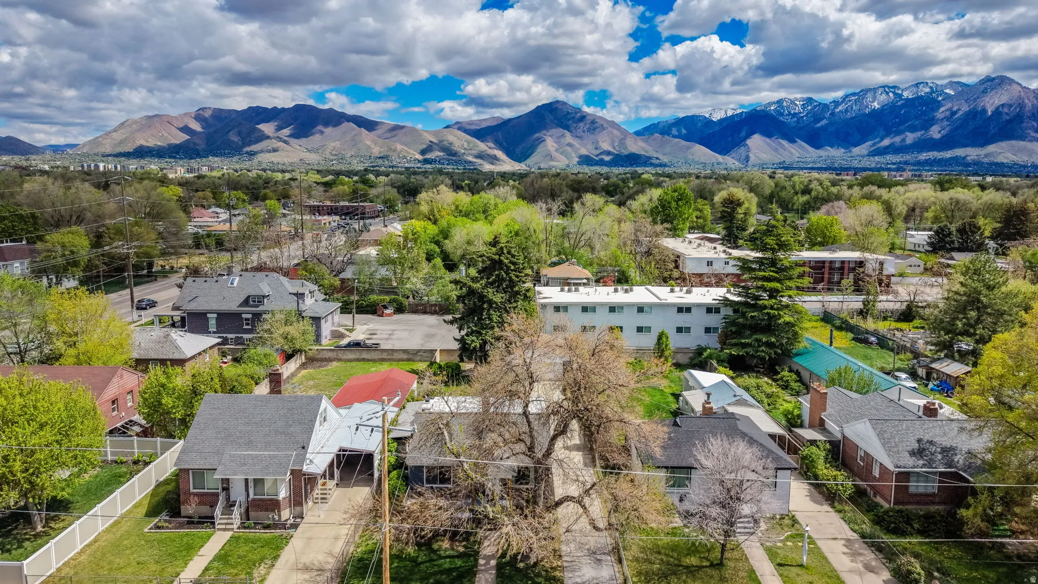 Aerial view of residential area with a mountain backdrop