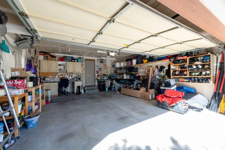 Garage featuring a workshop area