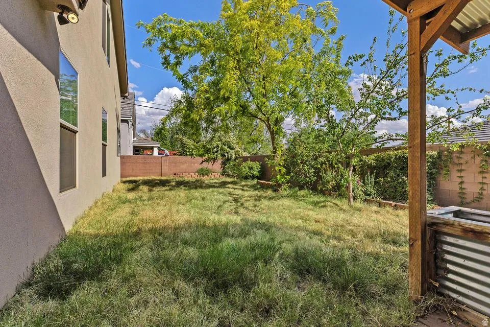 View of fenced backyard