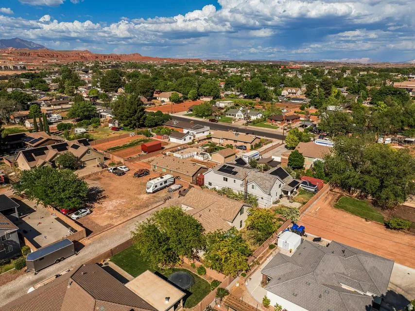 Aerial view of residential area with a mountain backdrop