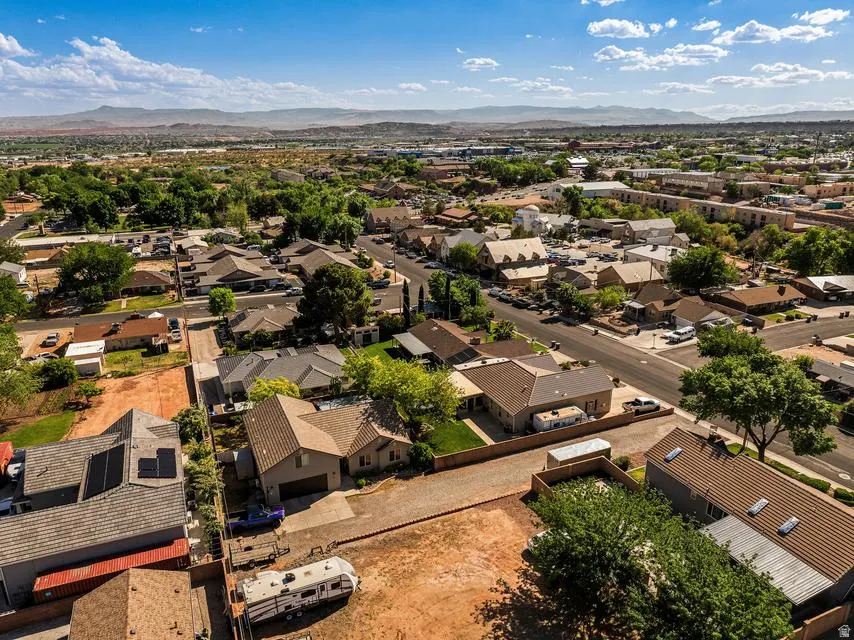 Aerial view of residential area with a mountainous background