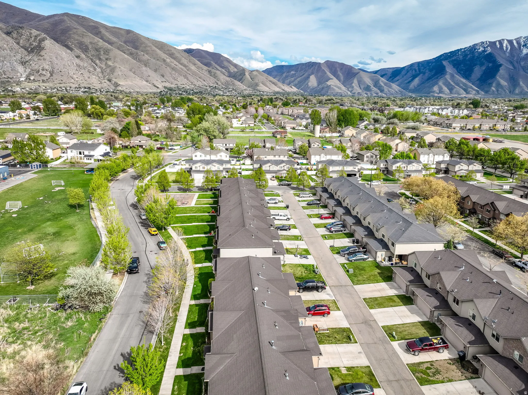 Aerial view of residential area with a mountainous background