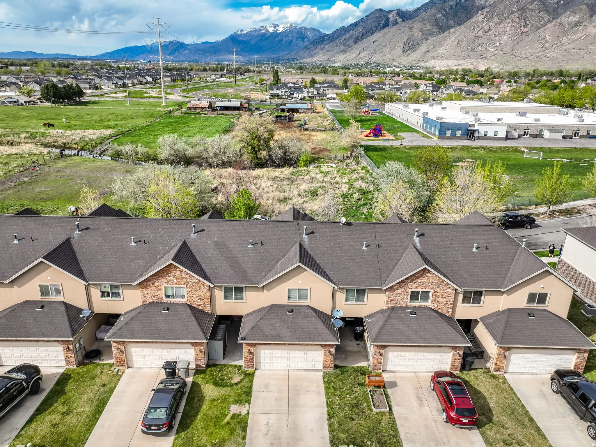 Aerial view of residential area with a mountain backdrop