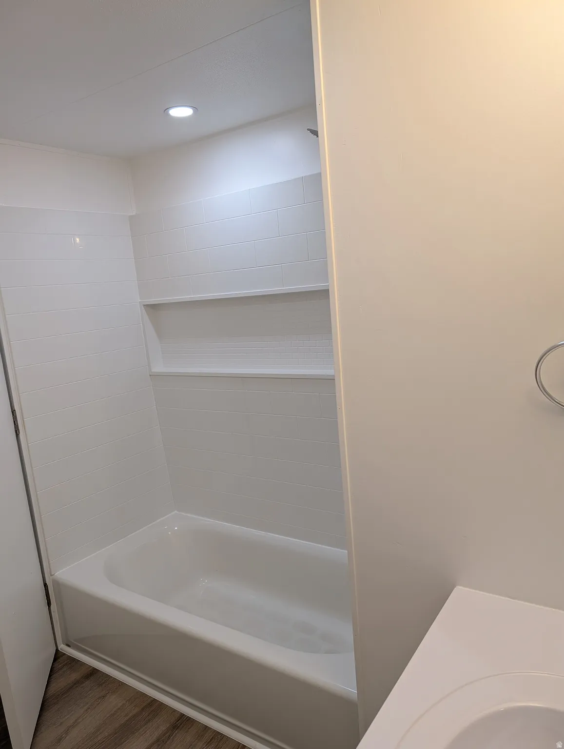 Full bathroom with vanity, bathtub / shower combination and recessed lighting