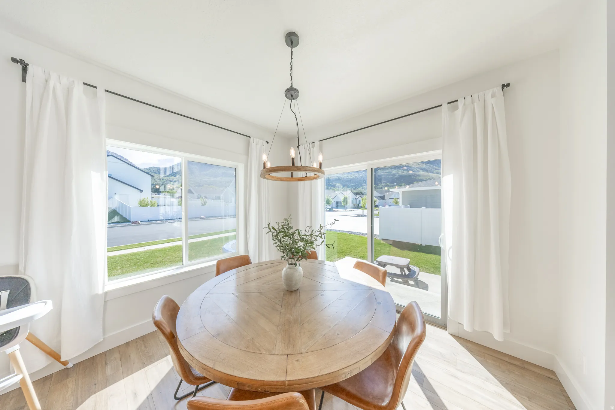 Dining room featuring a chandelier and light wood-style flooring