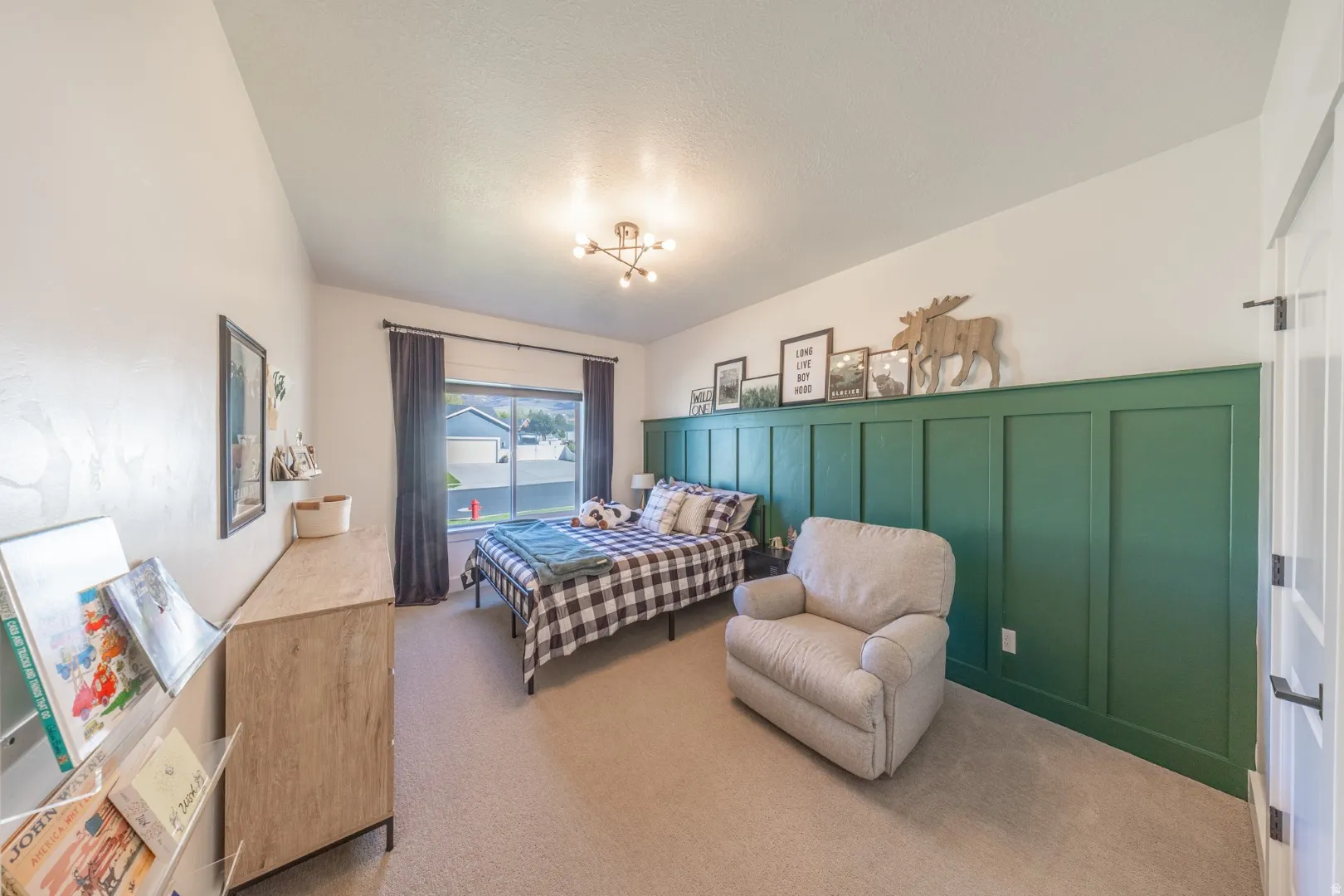 Bedroom featuring carpet flooring