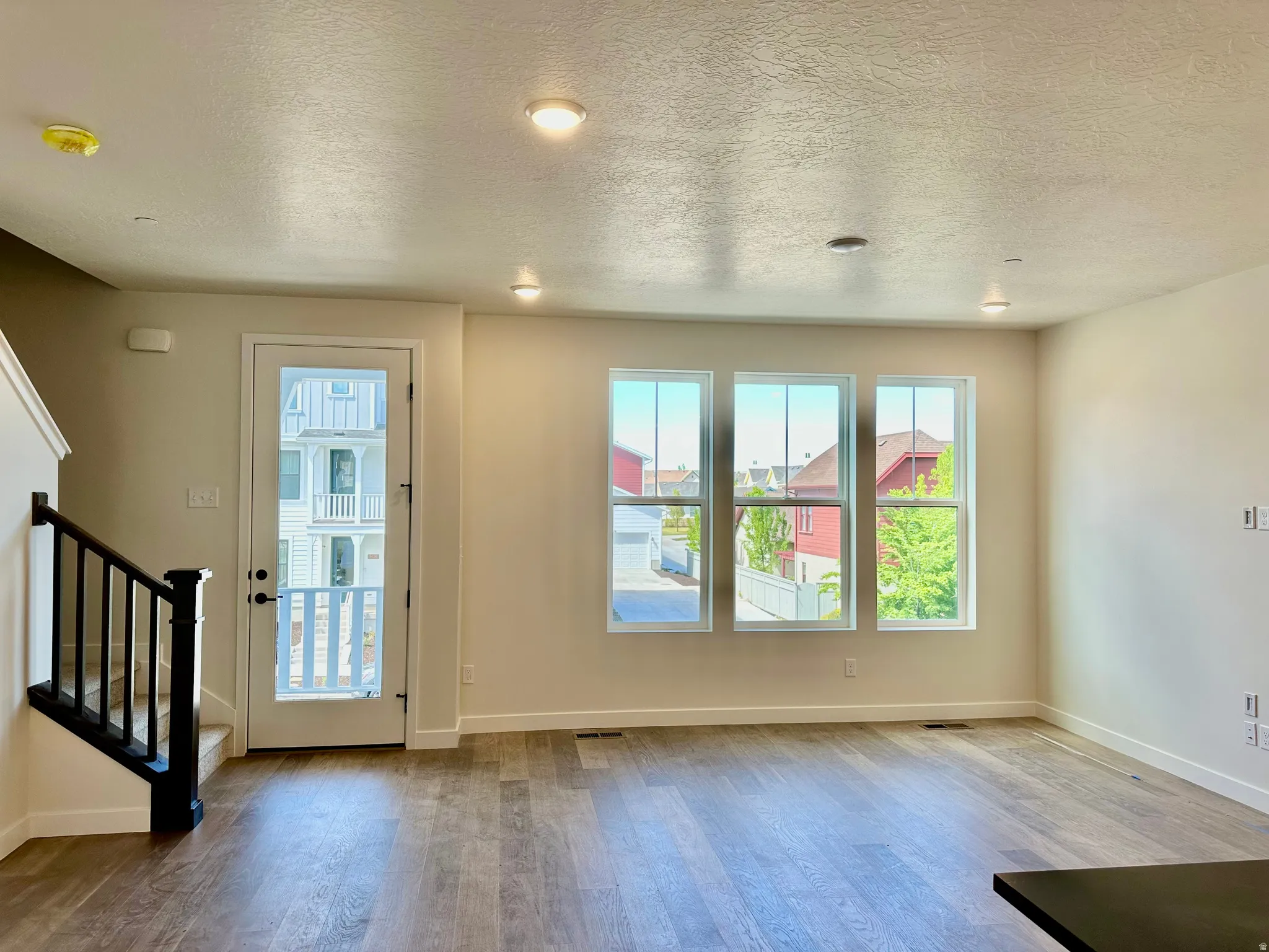Family room with incredible  views from large windows and covered deck