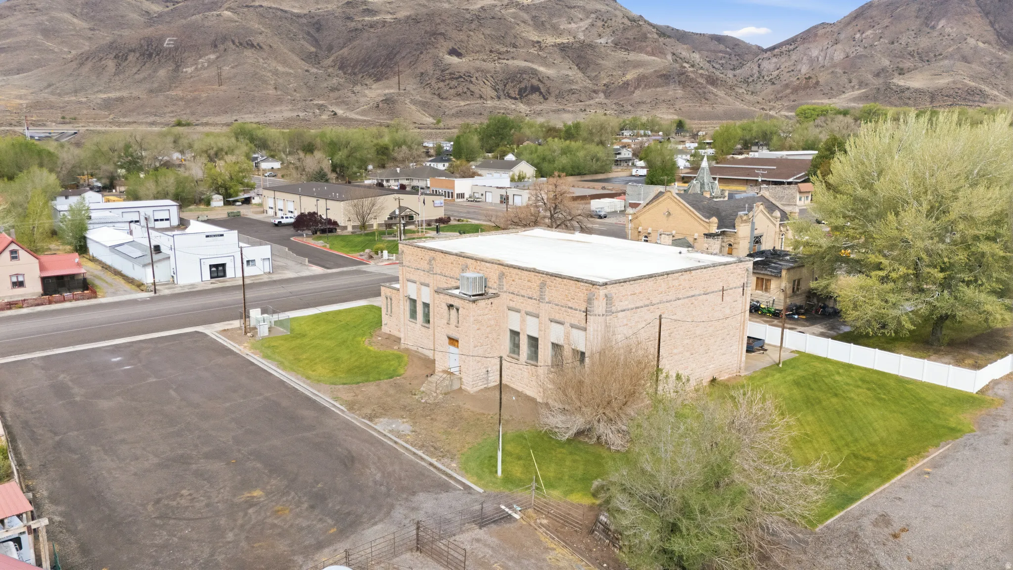 Aerial perspective of suburban area featuring mountains