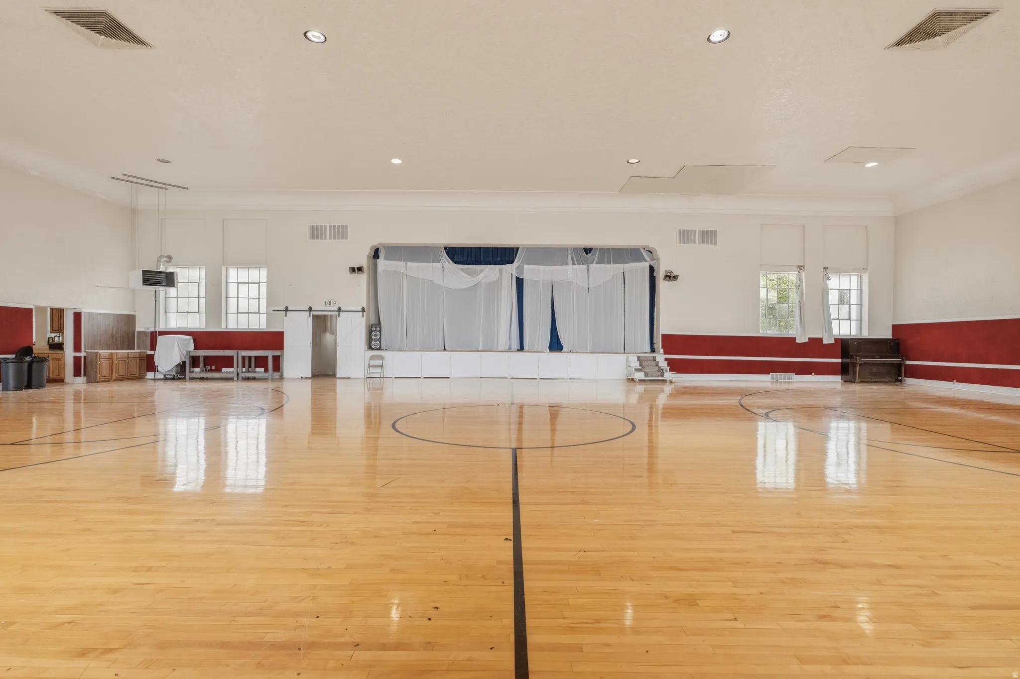 View of sport court with community basketball court and healthy amount of natural light