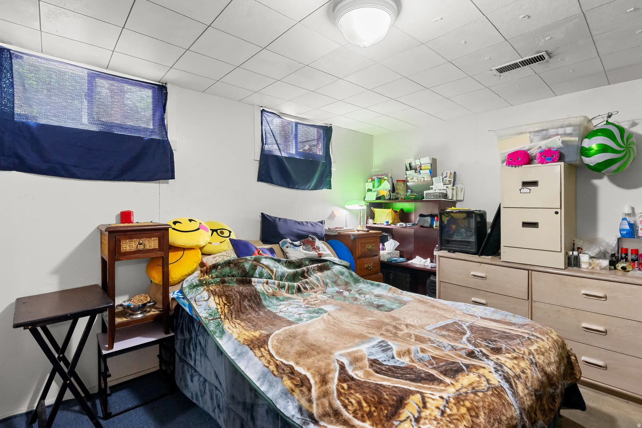 Bedroom with a drop ceiling