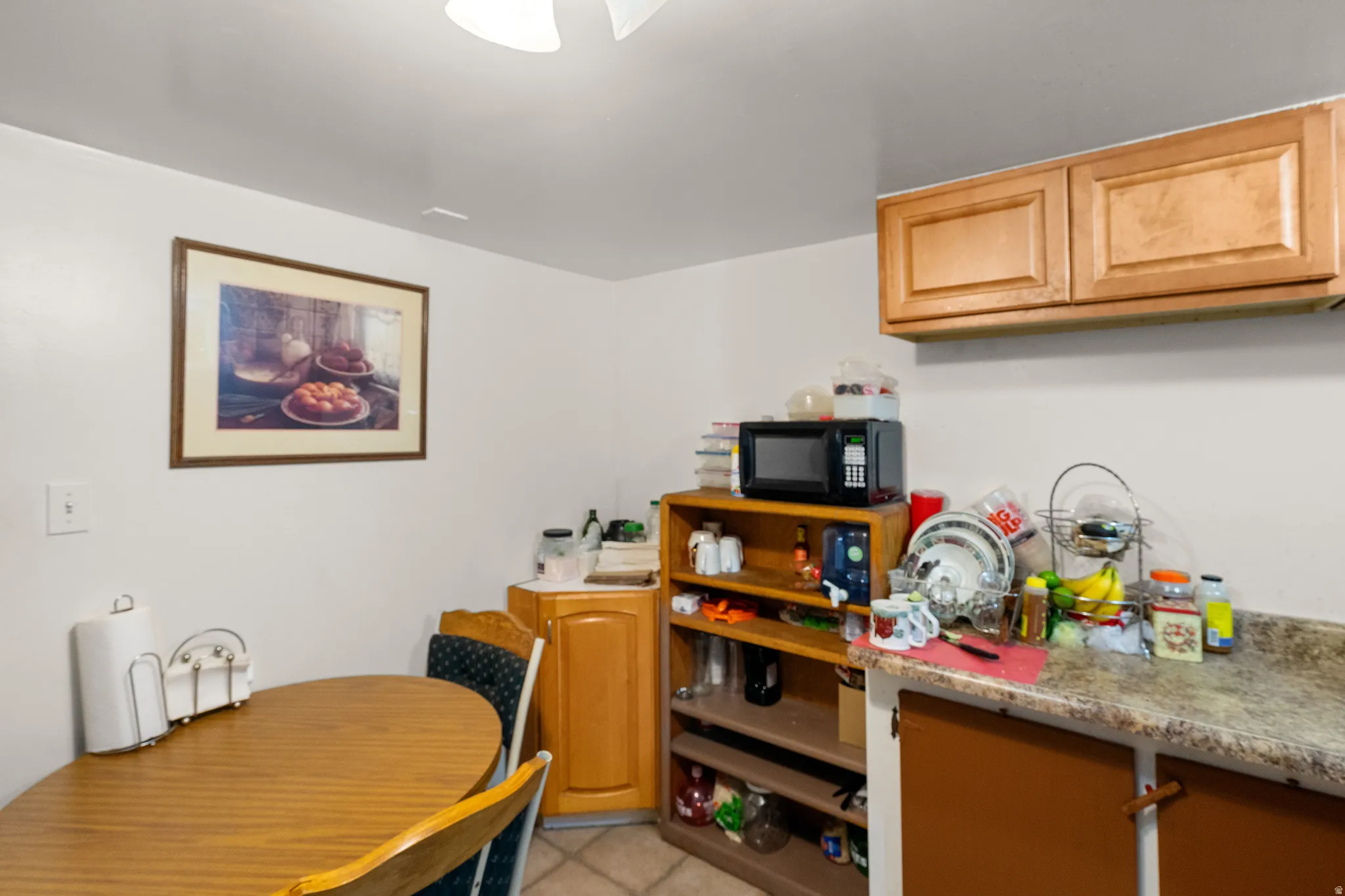 Kitchen featuring black microwave