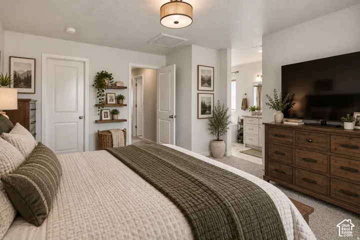 Recessed ceiling lighting, wood-finish floating shelves, ceiling fan with drum shade, white panel doors, and neutral wall tones