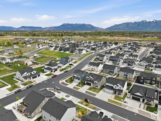 Aerial view of residential area with a mountain backdrop