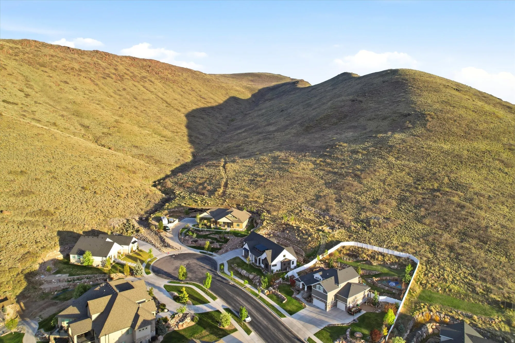 Aerial perspective of suburban area with mountains