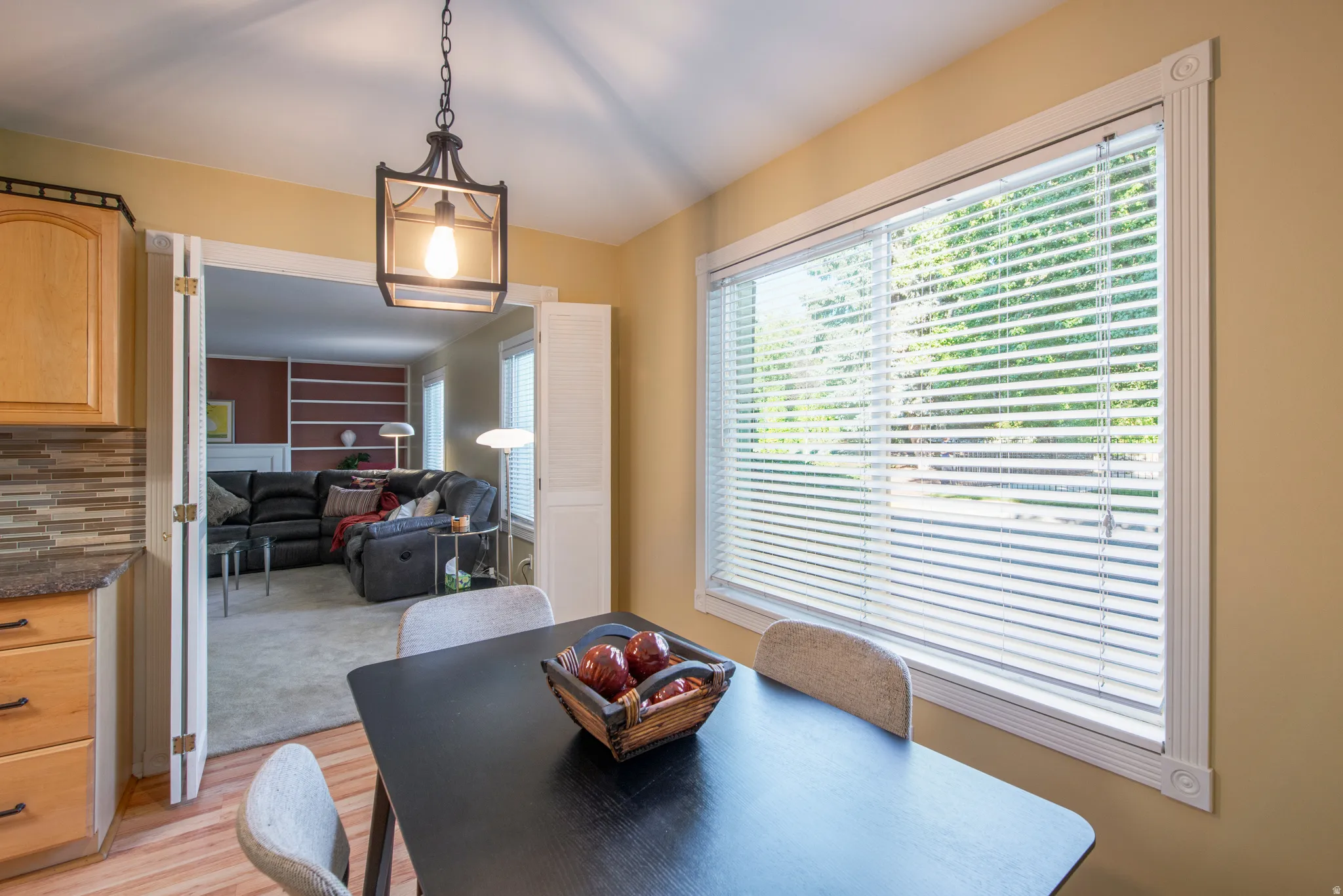 Dining space featuring light wood finished floors