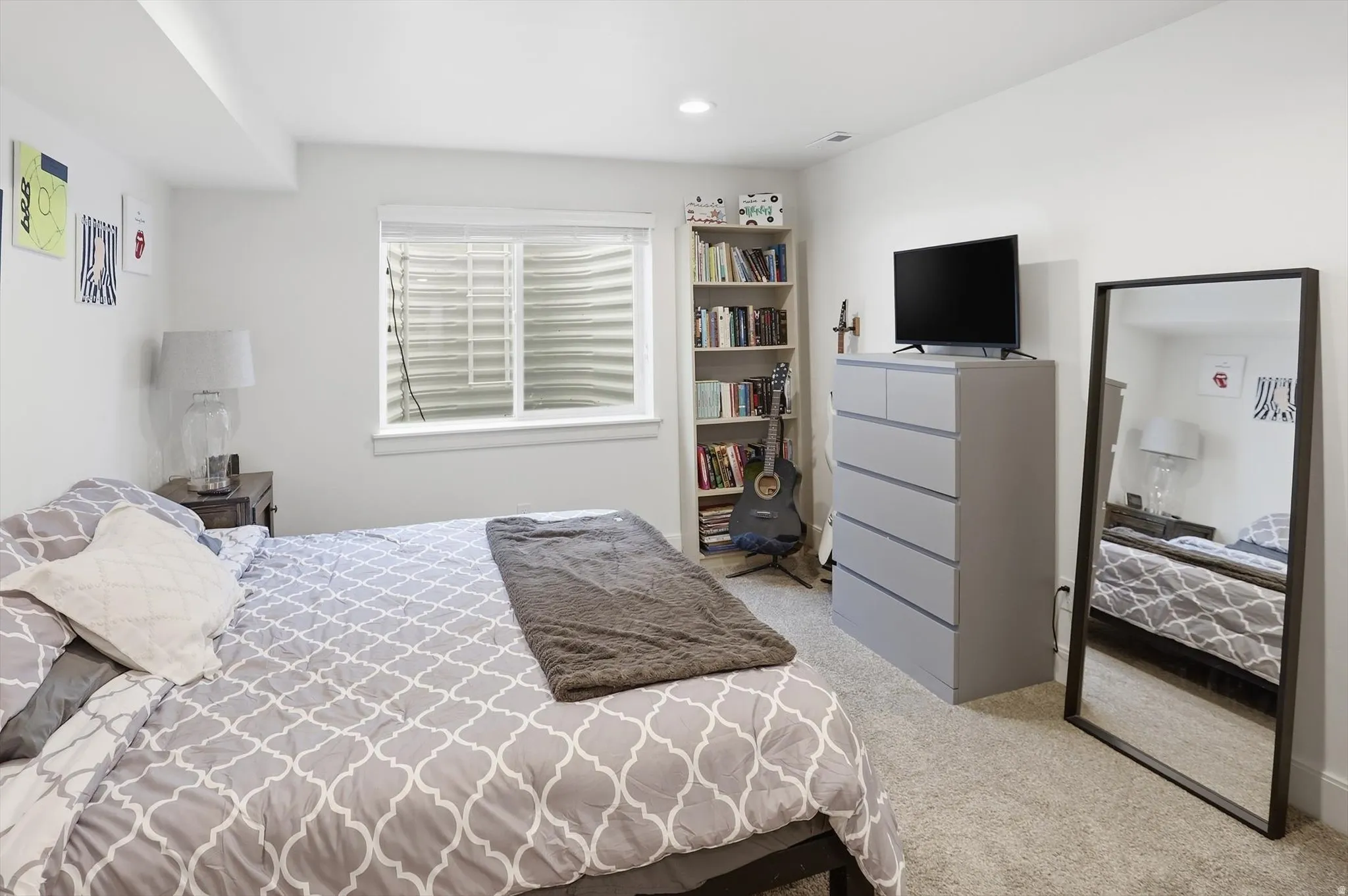 Bedroom featuring light colored carpet and recessed lighting