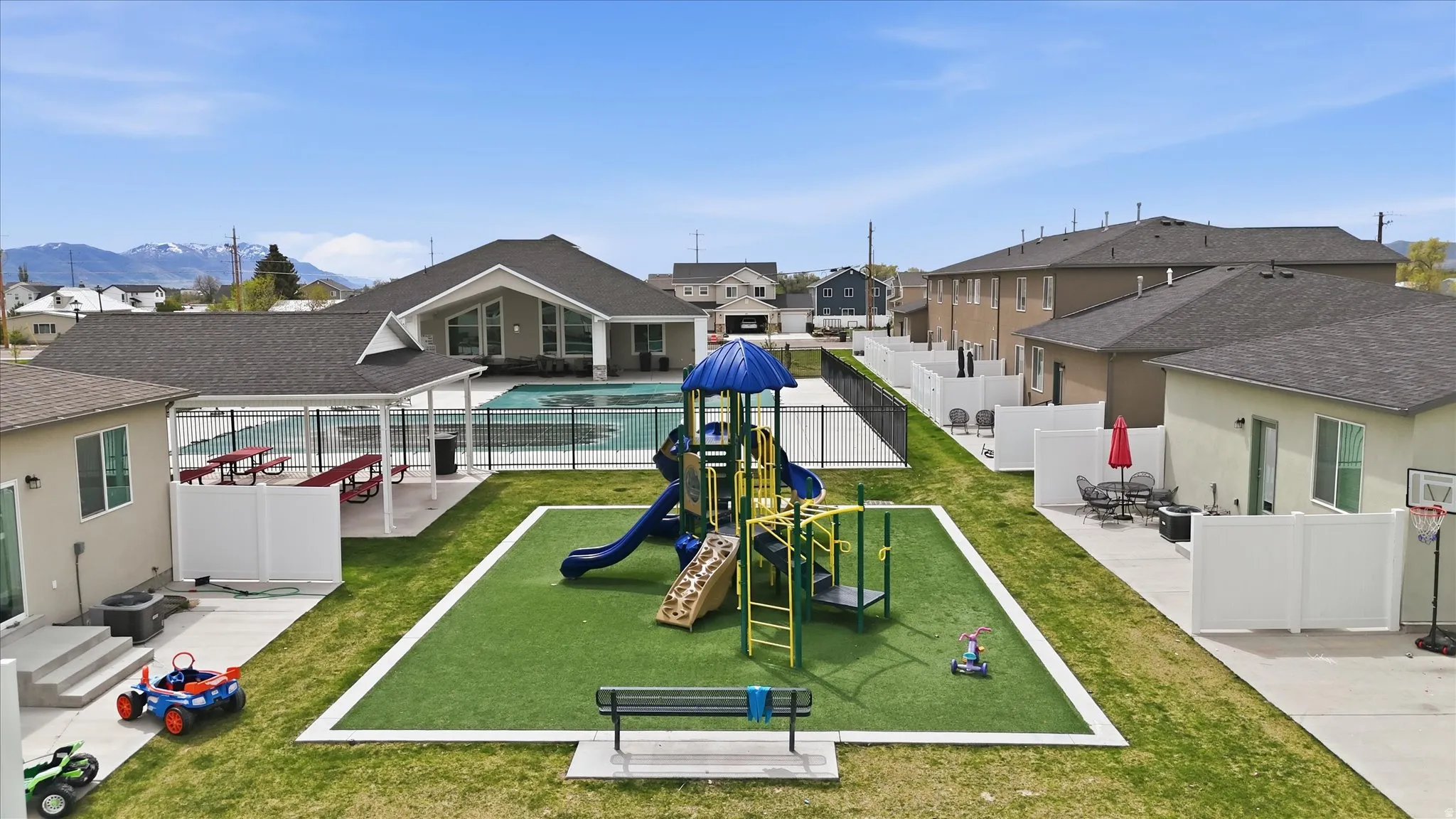 View of home's community featuring a patio area, a residential view, and a swimming pool