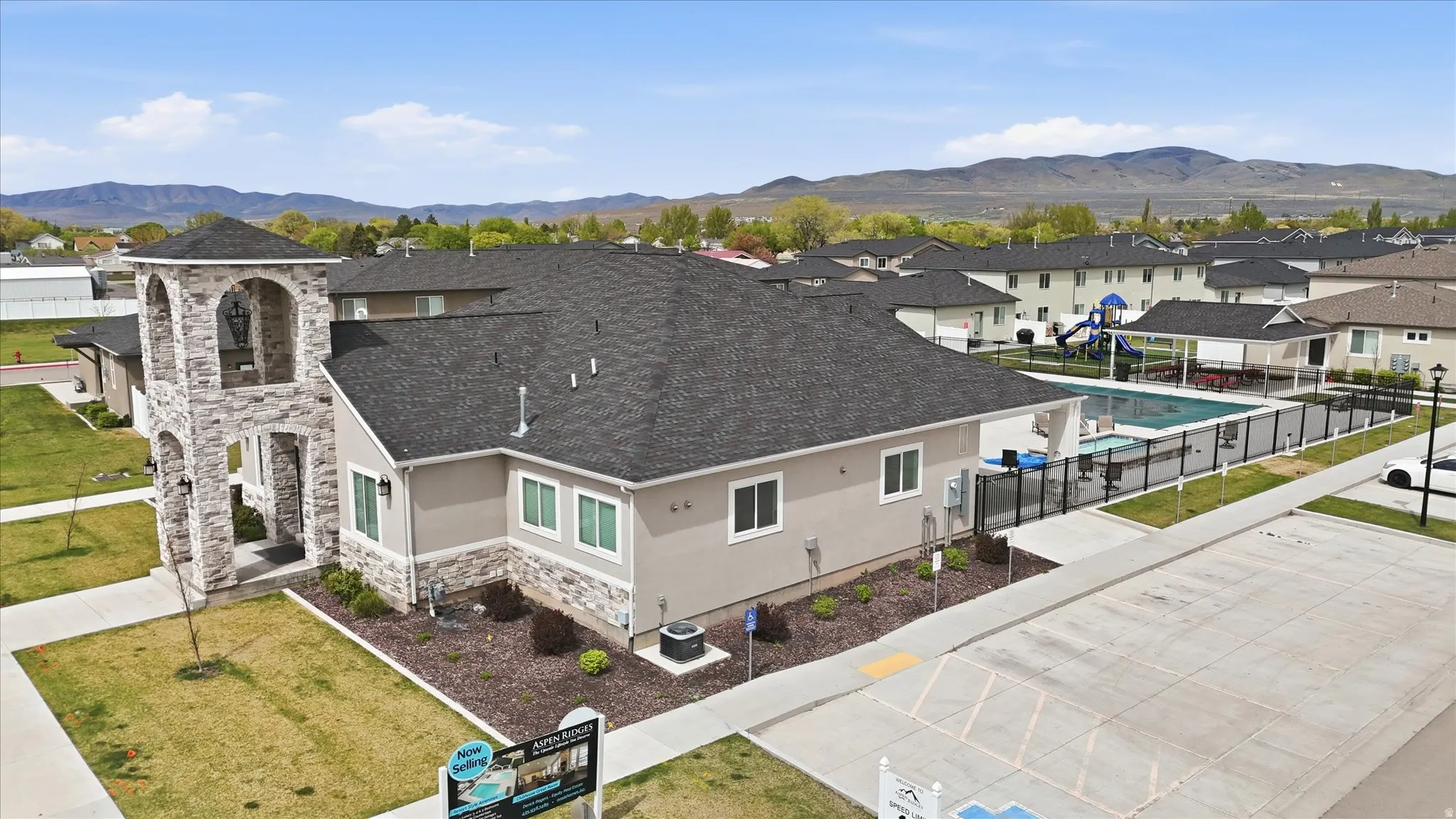 Aerial view of residential area with a mountain backdrop