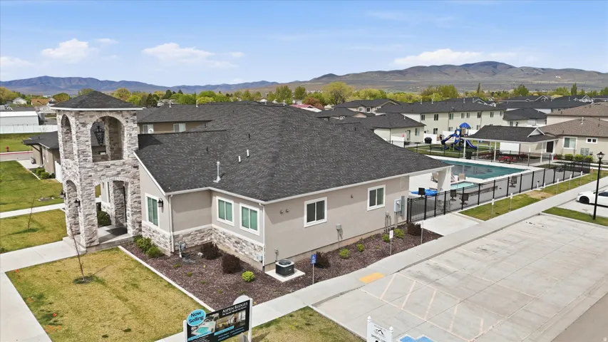 Aerial view of residential area with a mountain backdrop
