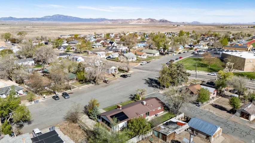 Aerial perspective of suburban area with mountains