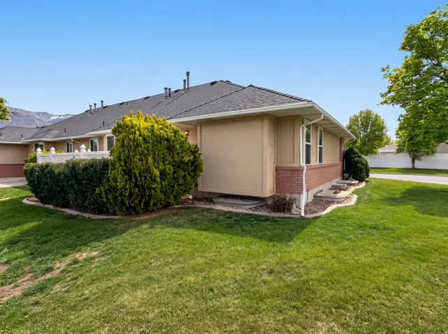 View of home's exterior featuring brick siding