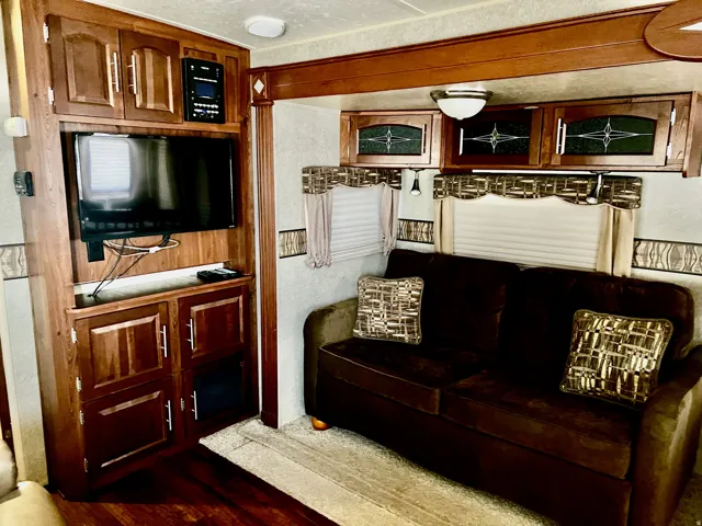 Living room with dark wood-style flooring