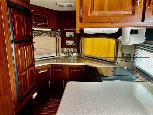Kitchen featuring light countertops