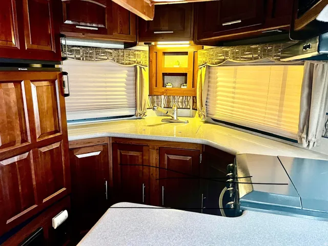 Kitchen featuring light countertops