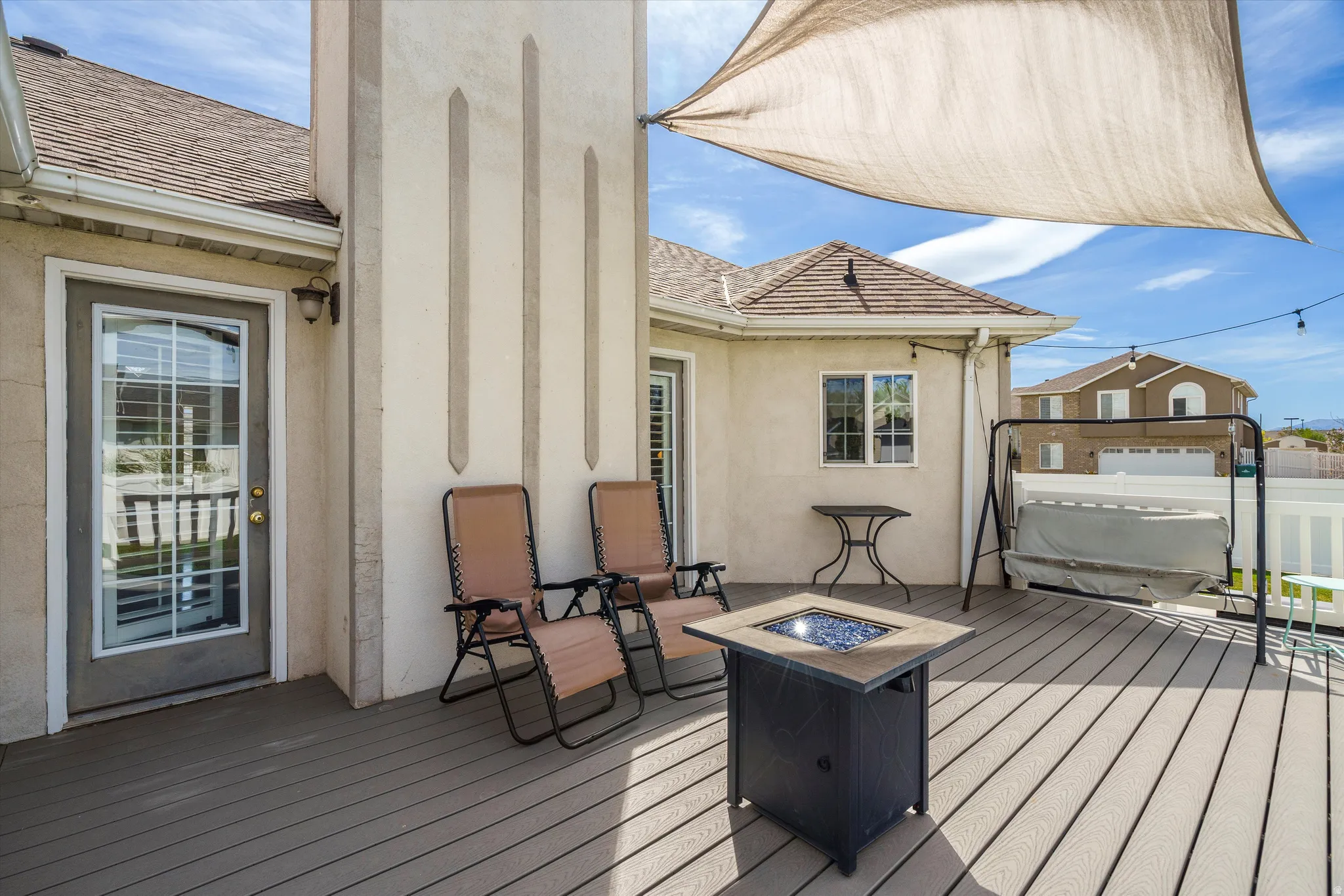 Composite deck with a fire pit