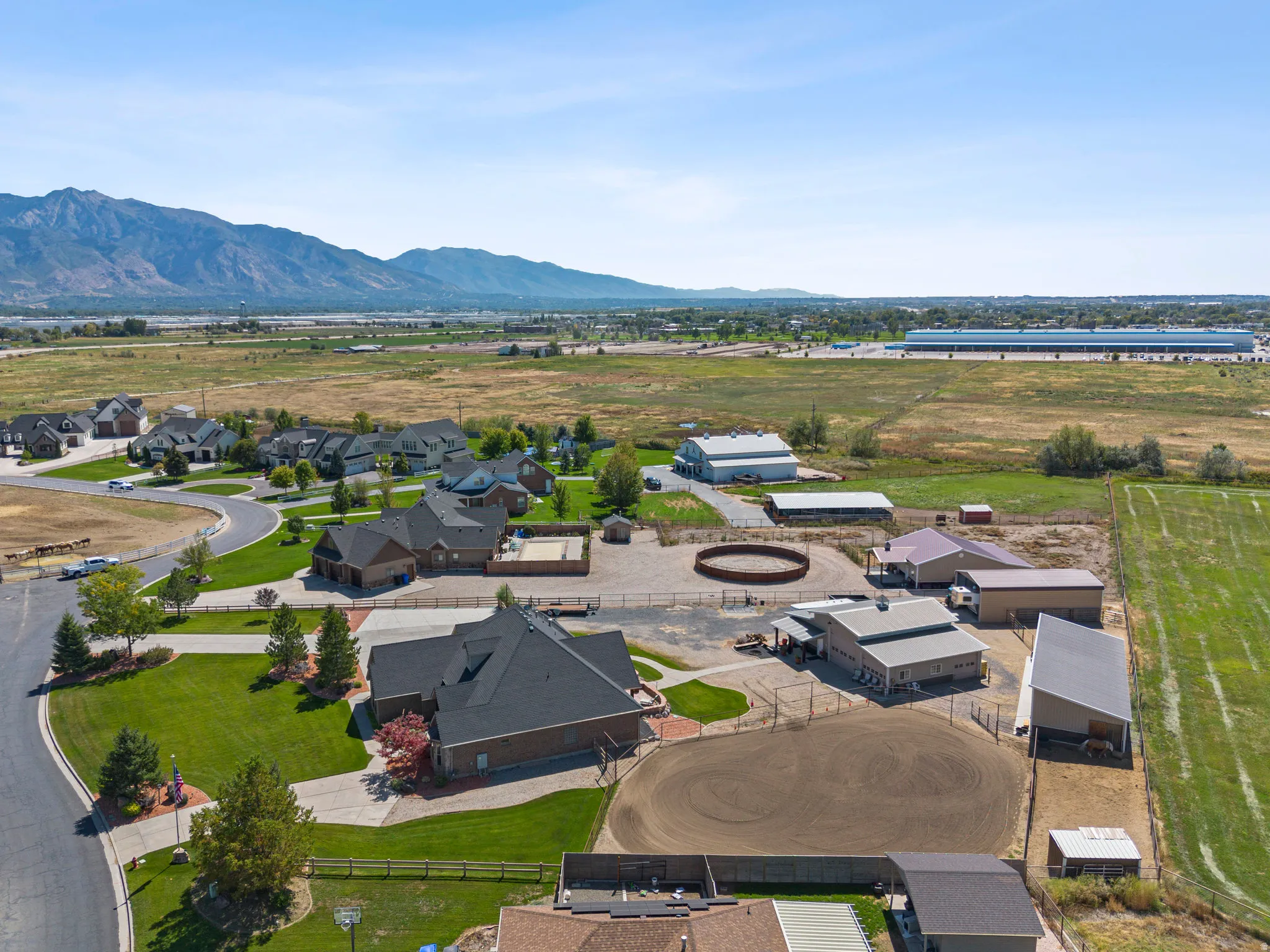 Aerial view of residential area featuring a mountain backdrop