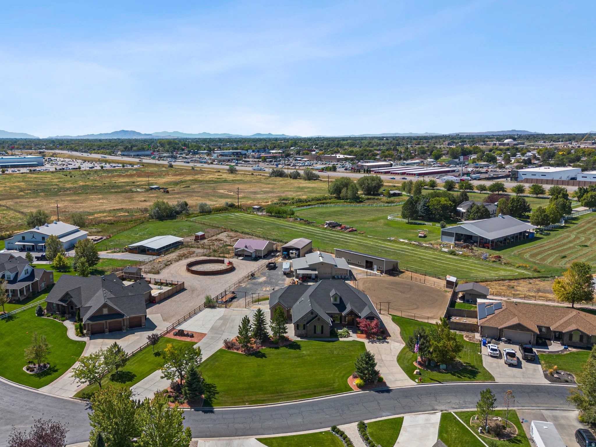 Aerial perspective of suburban area featuring a mountainous background